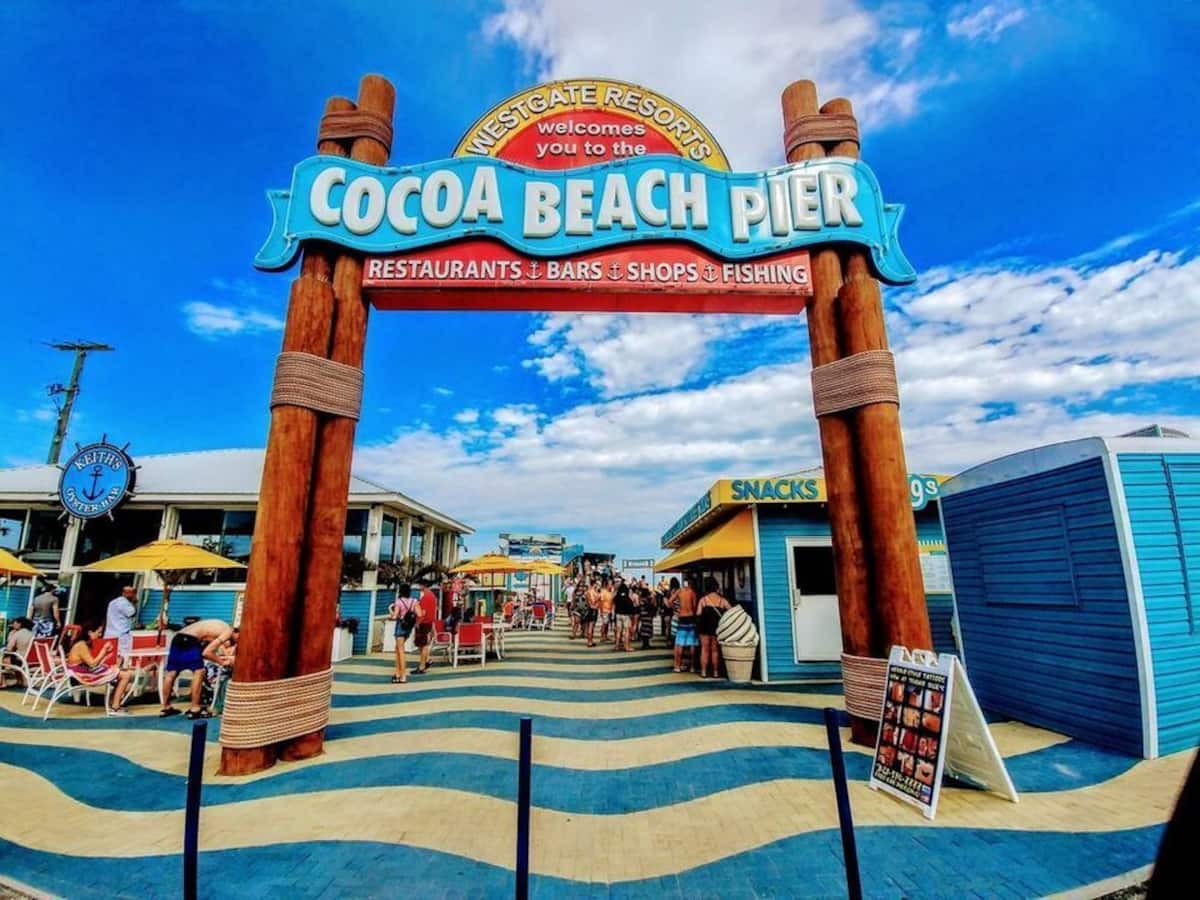 Entrance to the Cocoa Beach Pier with shops and restaurants
