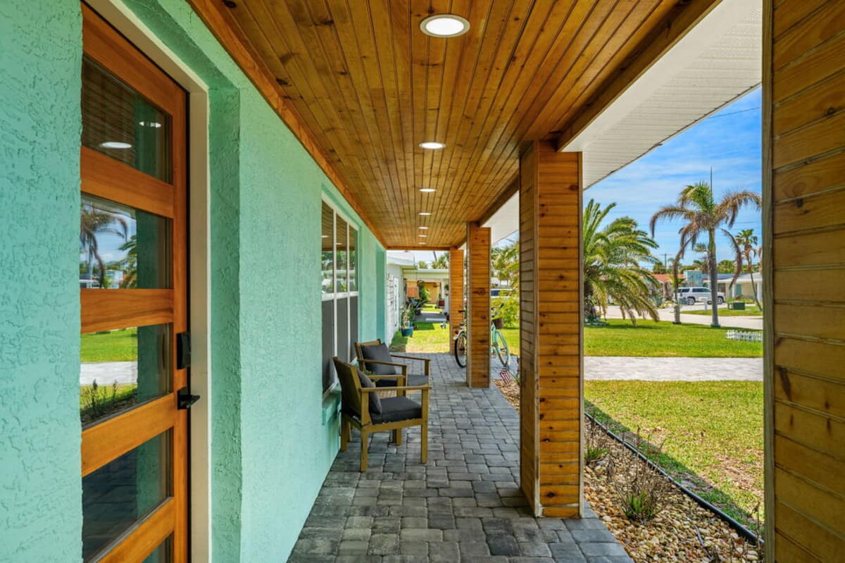 Covered breezeway leading to the backyard patio