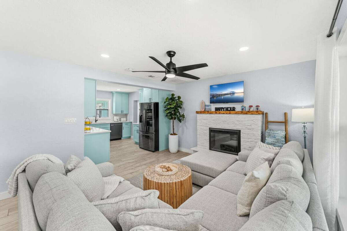 Comfortable sectional lounge with view into the kitchen