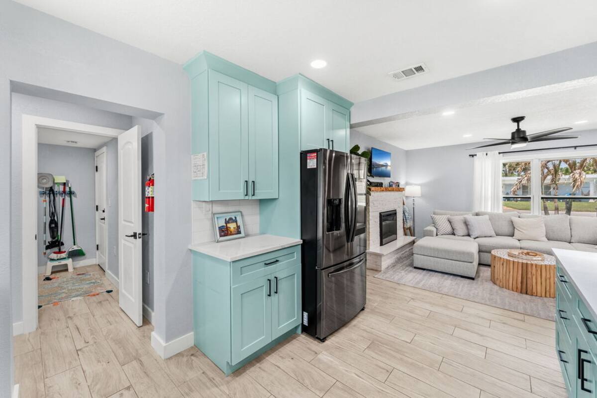 Kitchen open to the living room with breakfast seating